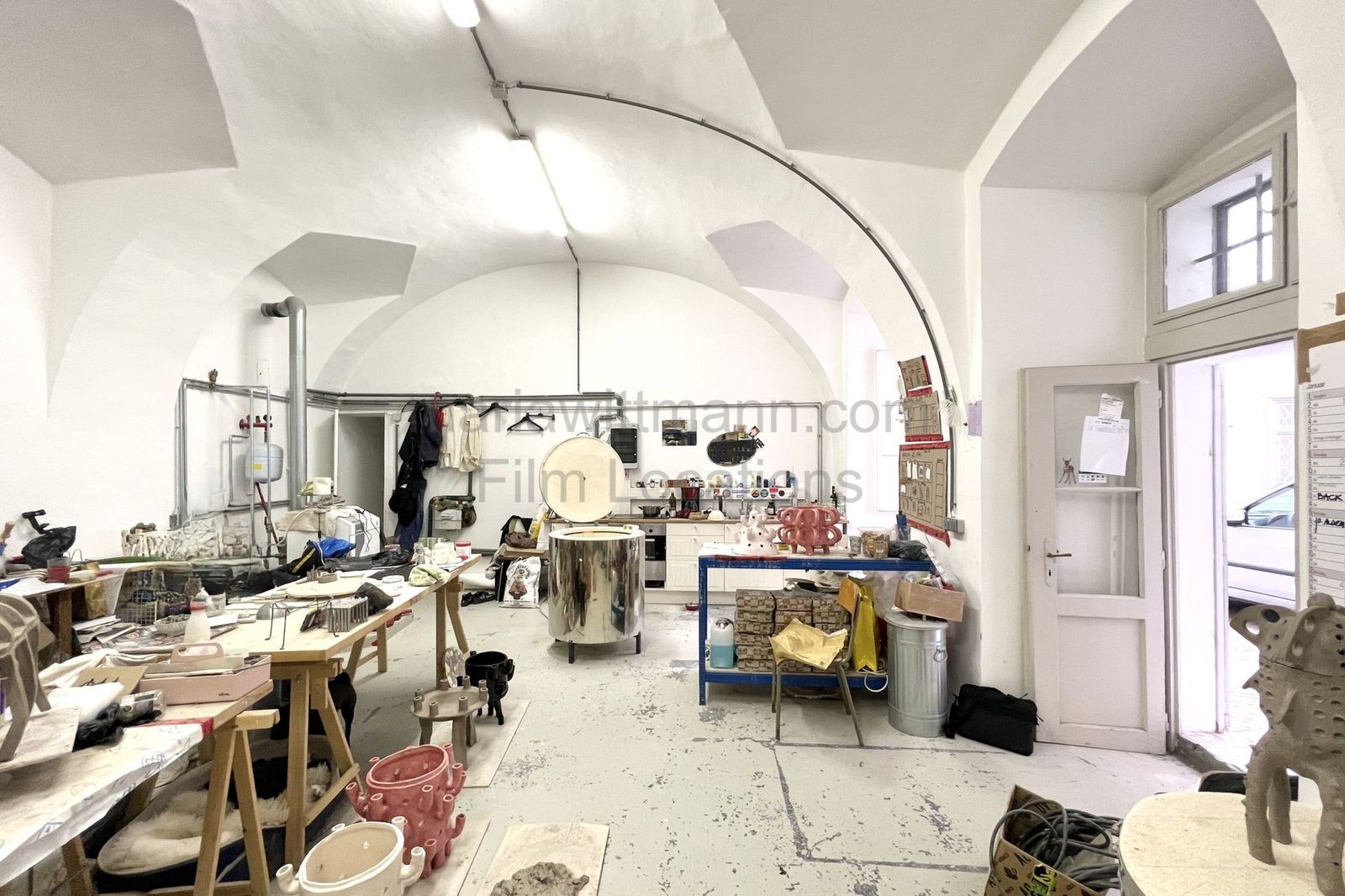 Industrial Vaulted Pottery Workshop with Brick Accent Wall - Photo 2
