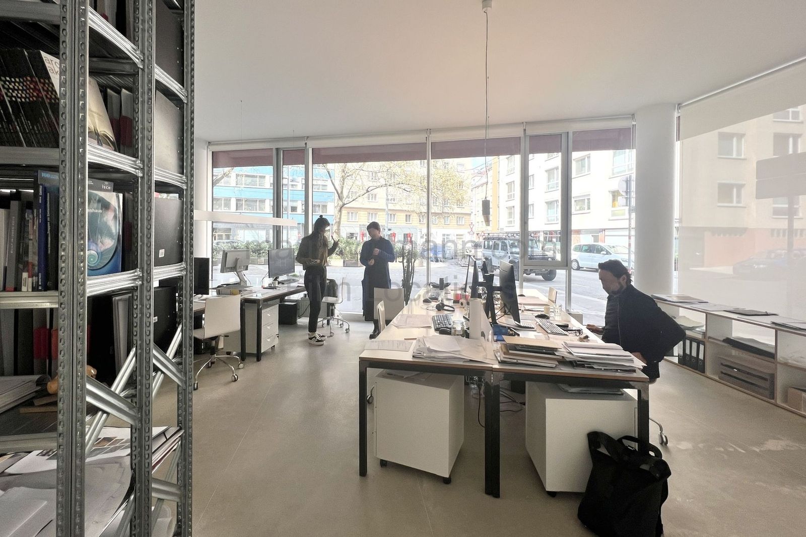 Minimalist Architectural Office with Floor-to-Ceiling Windows - Photo 8