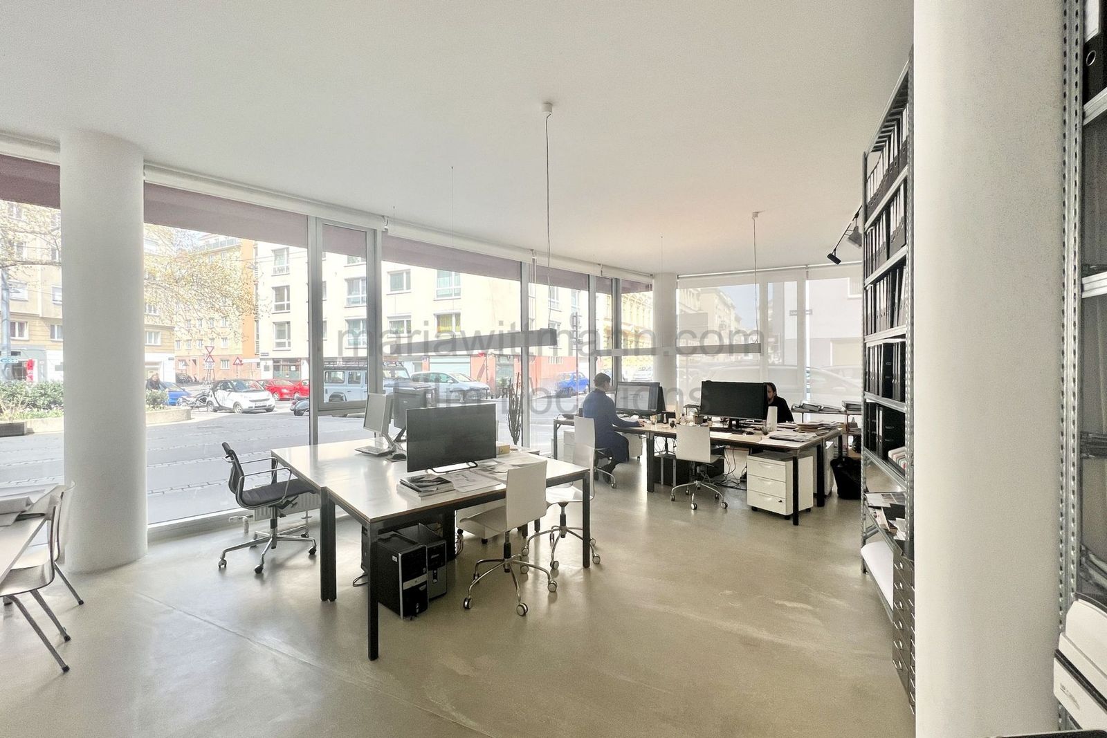 Minimalist Architectural Office with Floor-to-Ceiling Windows - Photo 6