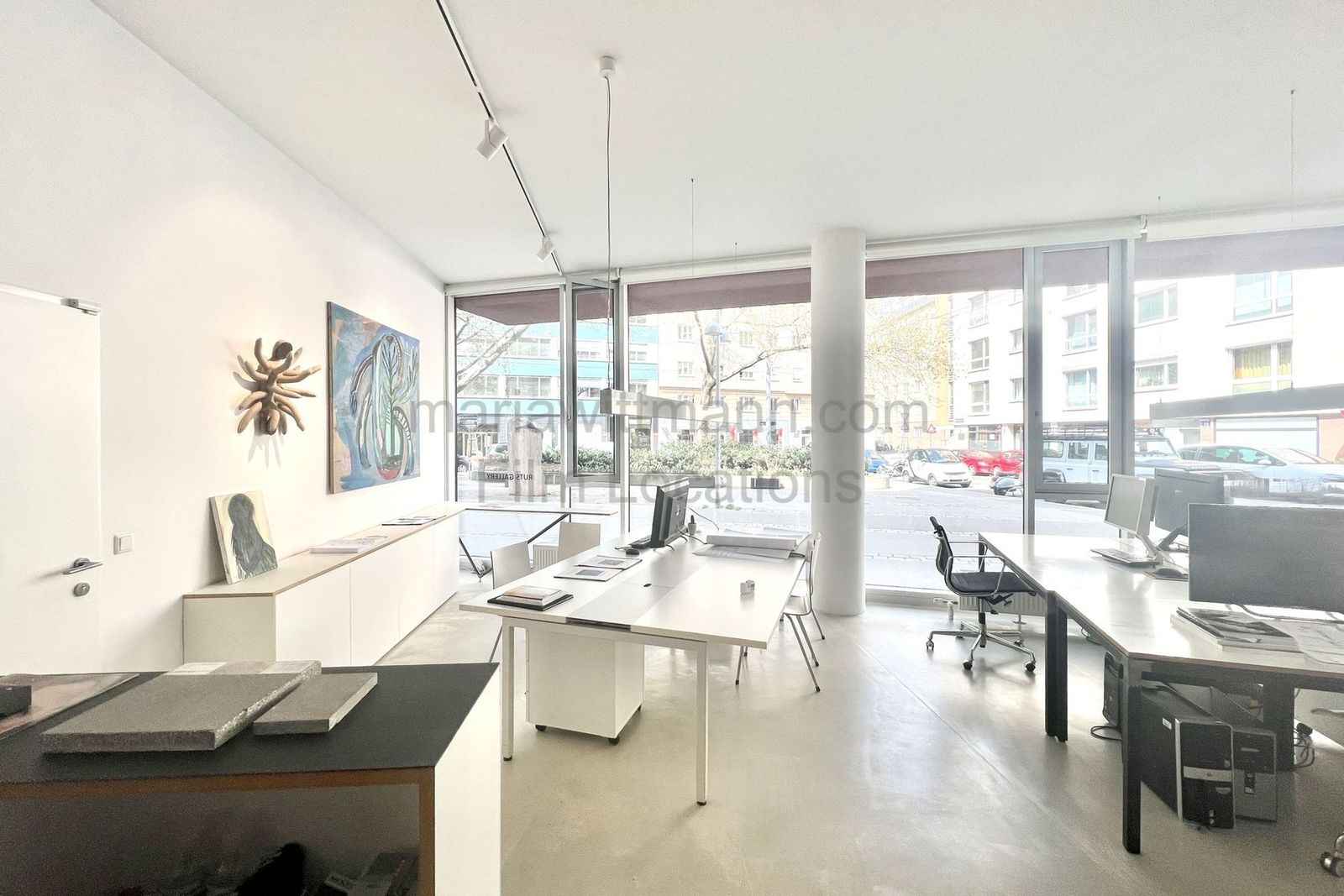 Minimalist Architectural Office with Floor-to-Ceiling Windows - Photo 10