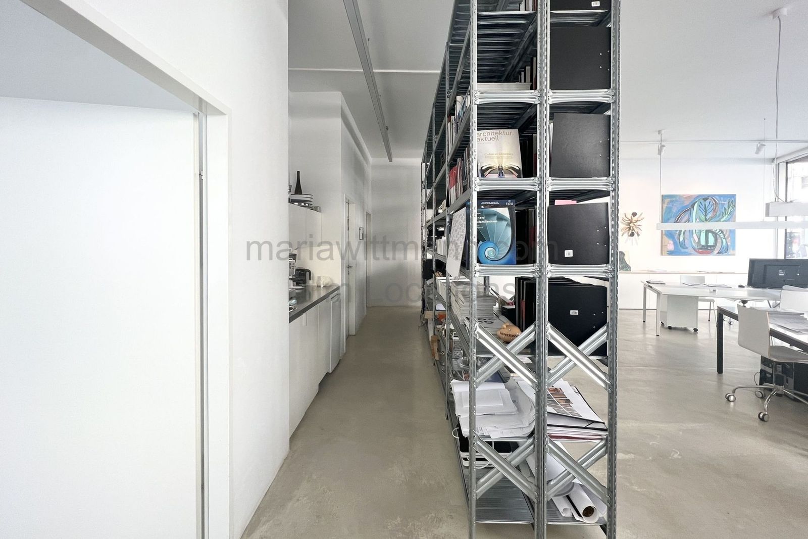 Minimalist Architectural Office with Floor-to-Ceiling Windows - Photo 4