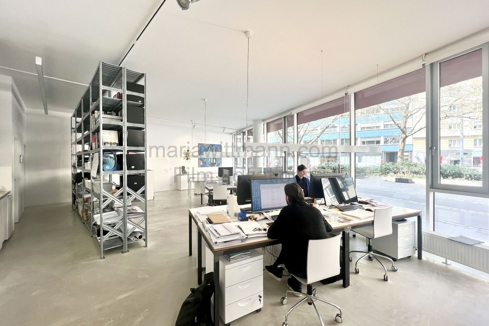Minimalist Architectural Office with Floor-to-Ceiling Windows - Photo 12