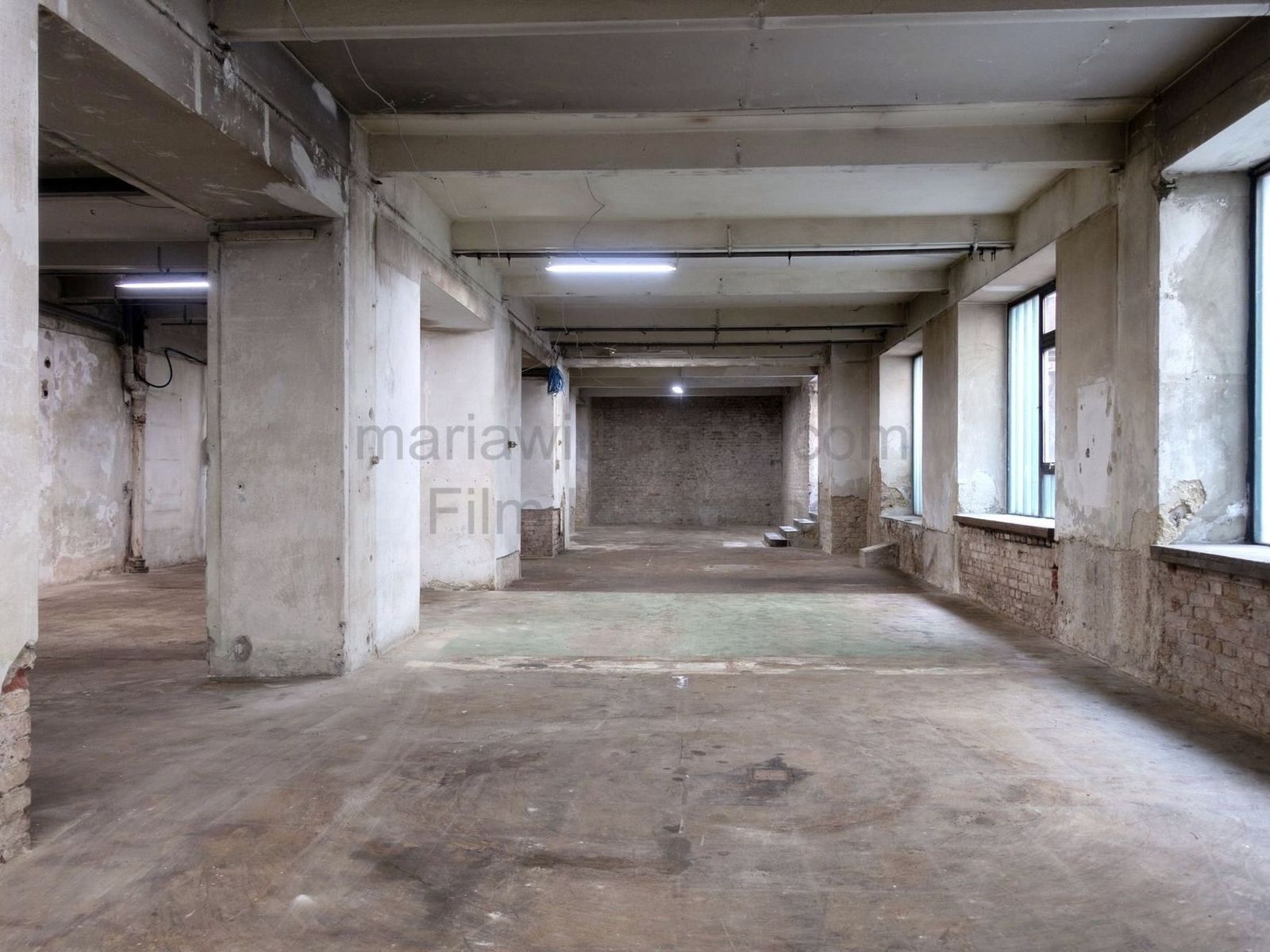Raw Industrial Loft with Exposed Concrete and Brick - Cover Photo