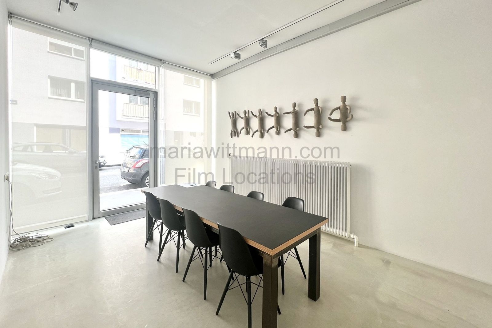 Minimalist Architectural Office with Floor-to-Ceiling Windows - Photo 5