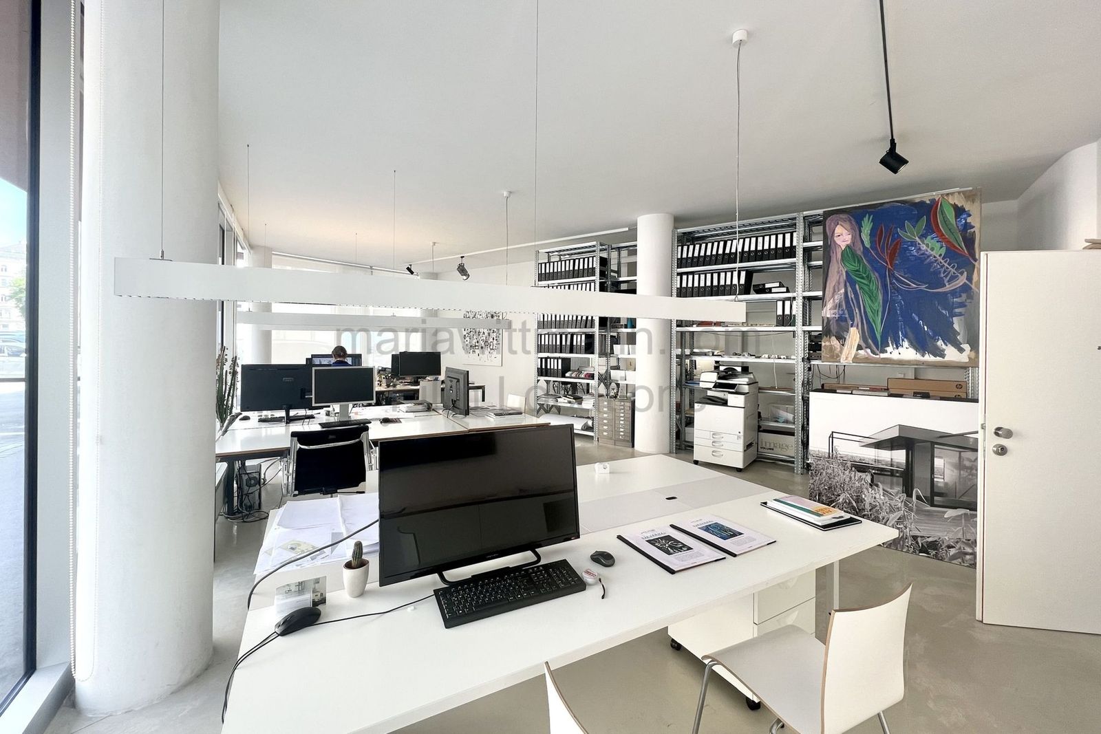 Minimalist Architectural Office with Floor-to-Ceiling Windows - Photo 3