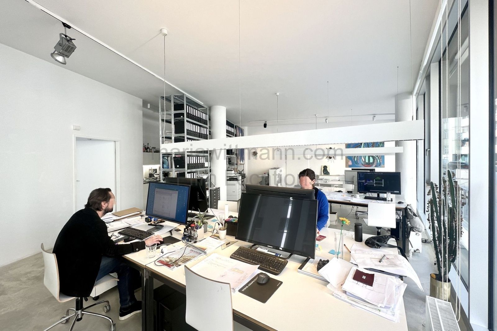 Minimalist Architectural Office with Floor-to-Ceiling Windows - Photo 14
