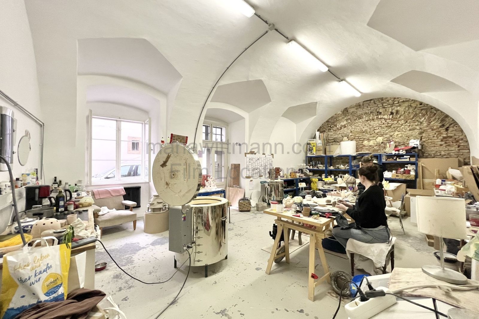 Industrial Vaulted Pottery Workshop with Brick Accent Wall - Photo 3