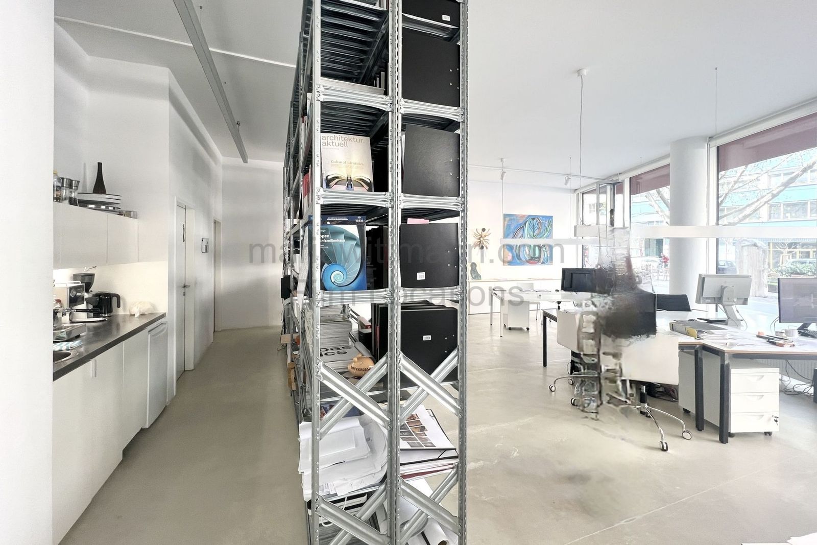 Minimalist Architectural Office with Floor-to-Ceiling Windows - Photo 13
