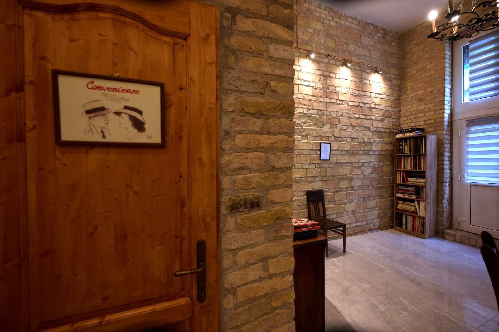 High-Ceiling Brick Gallery | Boutique Bohemian Interior - Photo 3