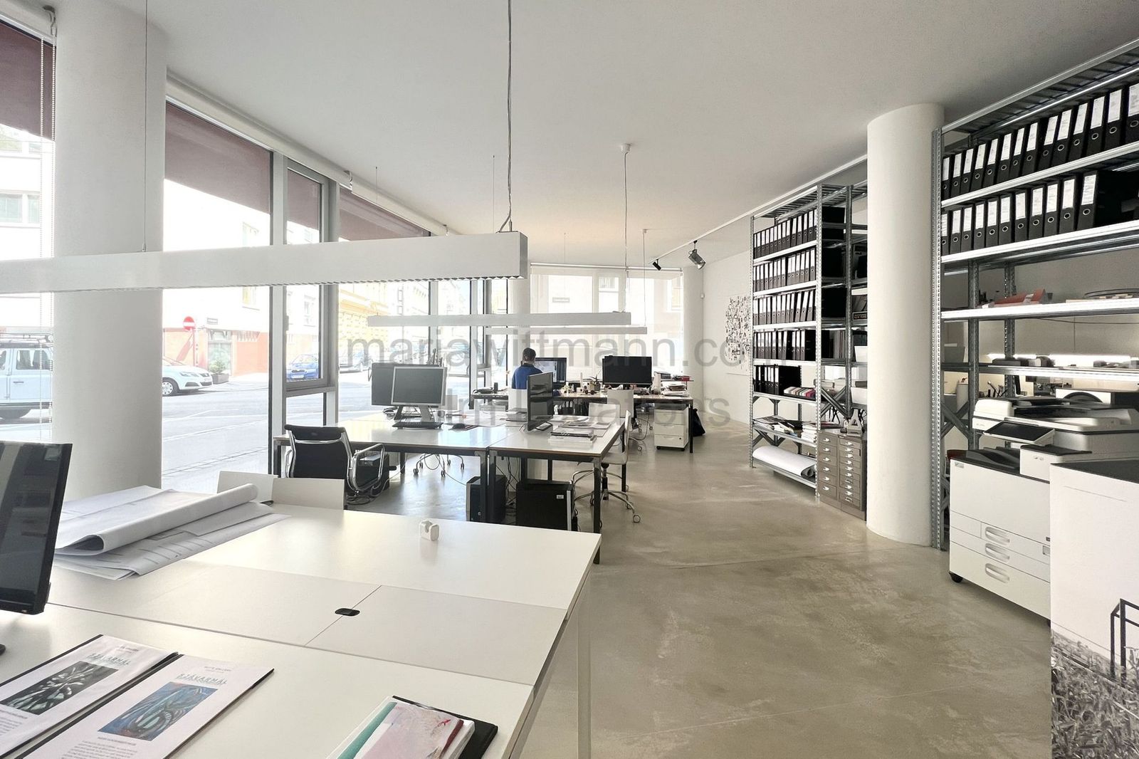 Minimalist Architectural Office with Floor-to-Ceiling Windows - Photo 7