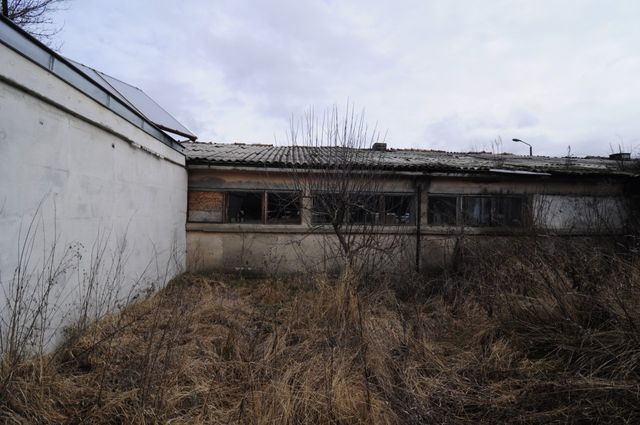 Industrial building - woodworking/carpentry shop, old cow barns - former collective farm from the socialist regime