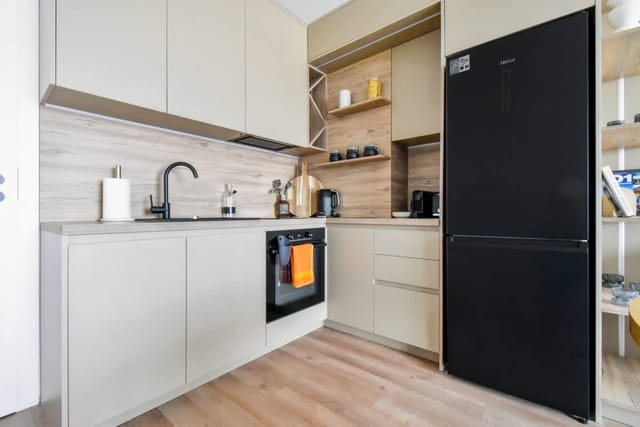 Modern & Quiet 1BR Near Center + Private Parking