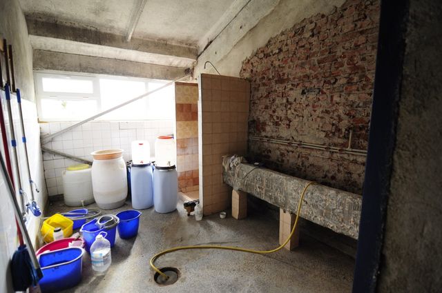 Industrial building - woodworking/carpentry shop, old cow barns - former collective farm from the socialist regime