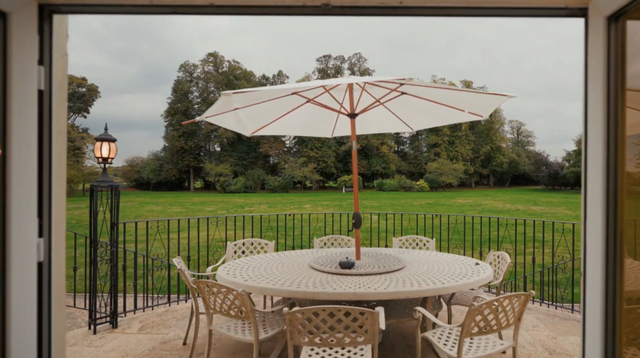 Elegant Regency estate with a private lake and indoor pool, quirky details