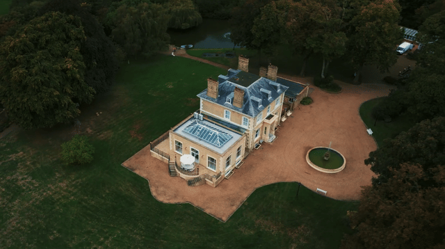 Elegant Regency estate with a private lake and indoor pool, quirky details