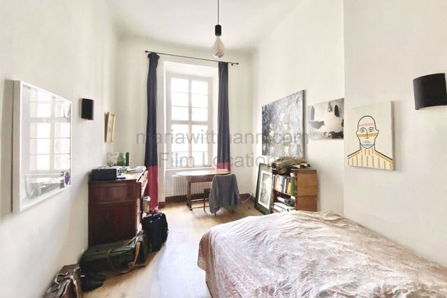Historic Apartment with Tall Windows and High Ceilings