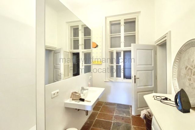 Historic Apartment with Tall Windows and High Ceilings