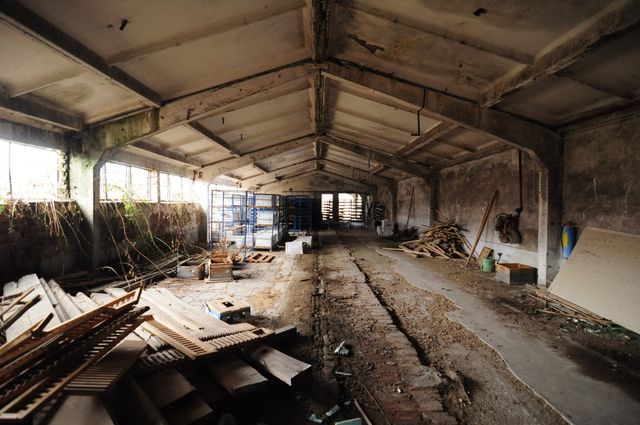 Industrial building - woodworking/carpentry shop, old cow barns - former collective farm from the socialist regime