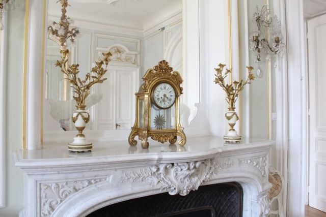 Evxinograd Palace, built in 1882, in Louis XIII French château style characterized by jointed brickwork, a high mansard roof with copper cladding and a clock tower.