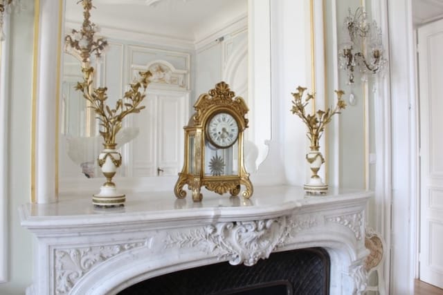 Evxinograd Palace, built in 1882, in Louis XIII French château style characterized by jointed brickwork, a high mansard roof with copper cladding and a clock tower.