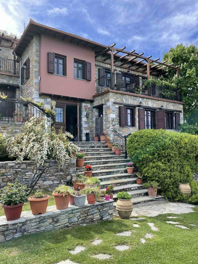 Small Luxury Hotel like an old Traditional house in Pelion with amazing garden and breathteking sea view to the agean.