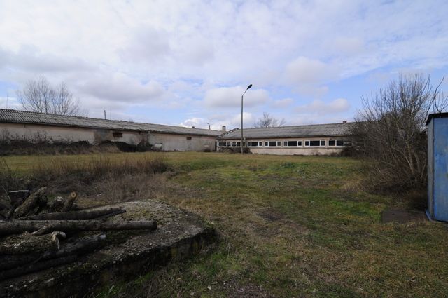 Industrial building - woodworking/carpentry shop, old cow barns - former collective farm from the socialist regime