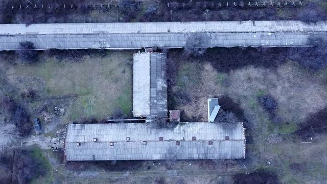 Industrial building - woodworking/carpentry shop, old cow barns - former collective farm from the socialist regime