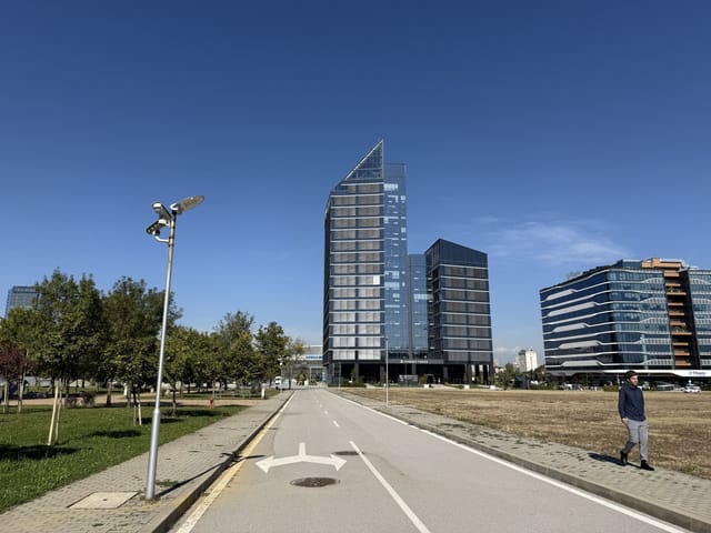 Big recognizable modern building with a bridge view of Sofia