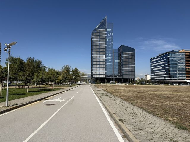 Big recognizable modern building with a bridge view of Sofia