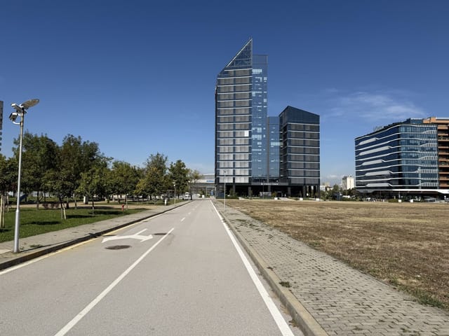 Big recognizable modern building with a bridge view of Sofia