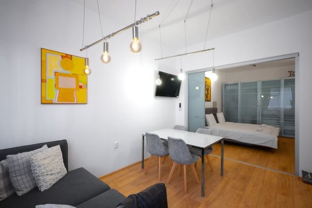 Modern 2BD Flat with Prime Location and Workspace