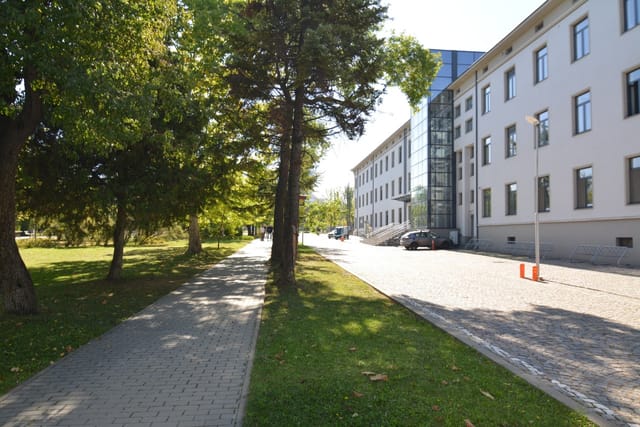 Big recognizable modern building with a bridge view of Sofia
