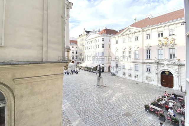 Historic Apartment with Tall Windows and High Ceilings