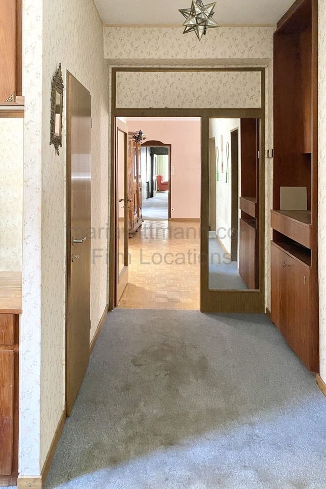 Period Apartment with Vintage Interior and Floral Motifs