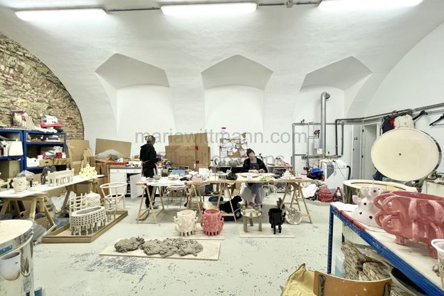 Industrial Vaulted Pottery Workshop with Brick Accent Wall