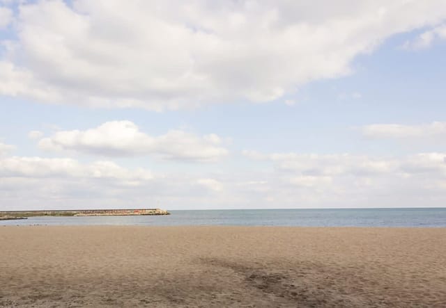 Sunny Studio in Hotel Berlin, Steps from the Beach