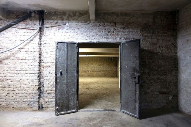 Raw Industrial Loft with Exposed Concrete and Brick