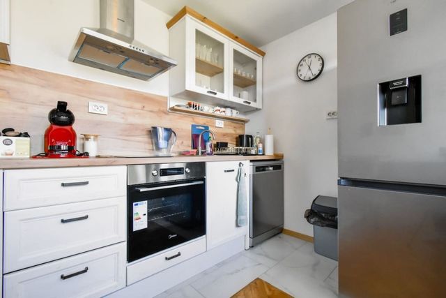 Split-Level City Stay with Balcony - Photo 2