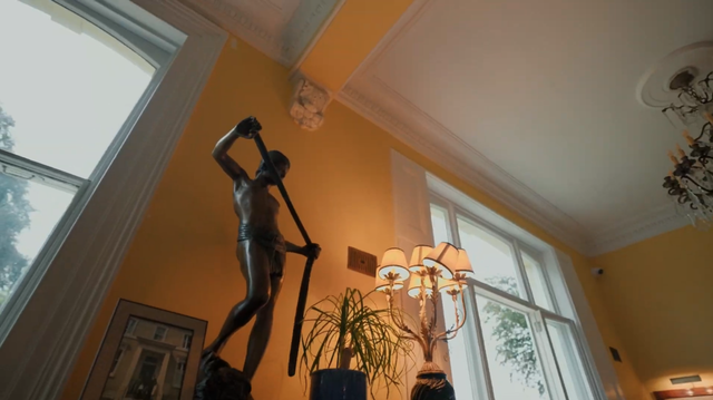 Elegant Regency estate with a private lake and indoor pool, quirky details