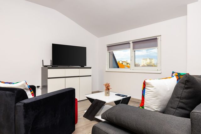 Top-Floor Flat with Balcony