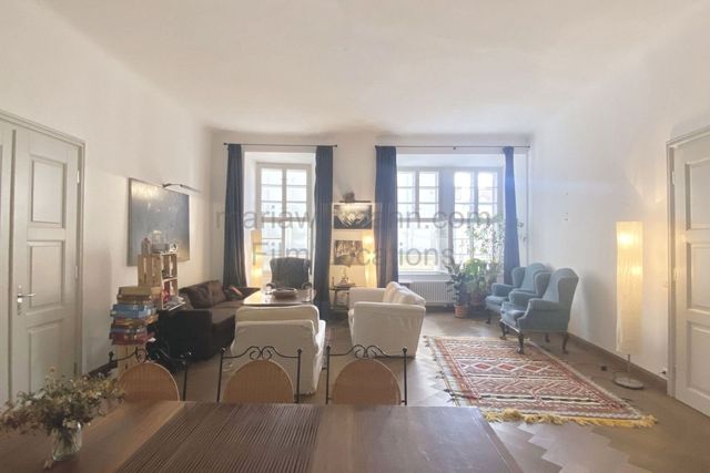 Historic Apartment with Tall Windows and High Ceilings