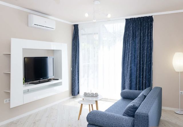 Sunny Blue  One-Bedroom Flat with Balcony