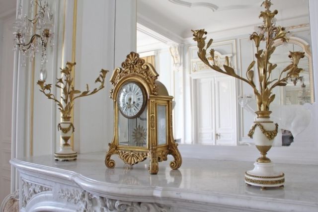 Evxinograd Palace, built in 1882, in Louis XIII French château style characterized by jointed brickwork, a high mansard roof with copper cladding and a clock tower.