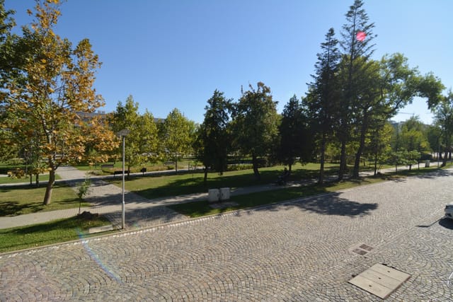 Big recognizable modern building with a bridge view of Sofia