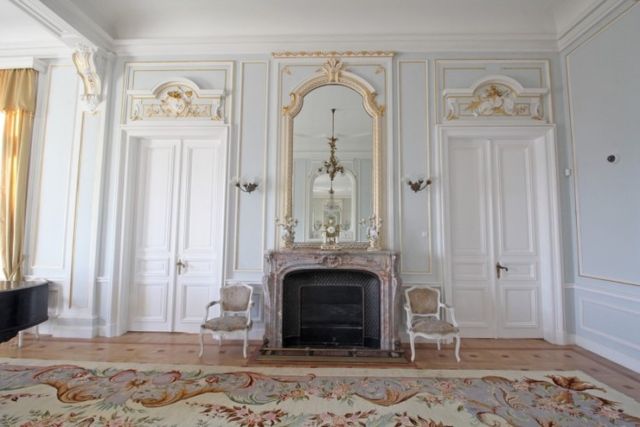 Evxinograd Palace, built in 1882, in Louis XIII French château style characterized by jointed brickwork, a high mansard roof with copper cladding and a clock tower.