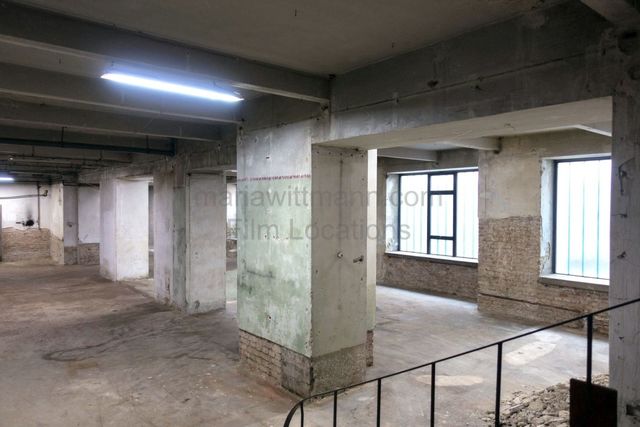 Raw Industrial Loft with Exposed Concrete and Brick