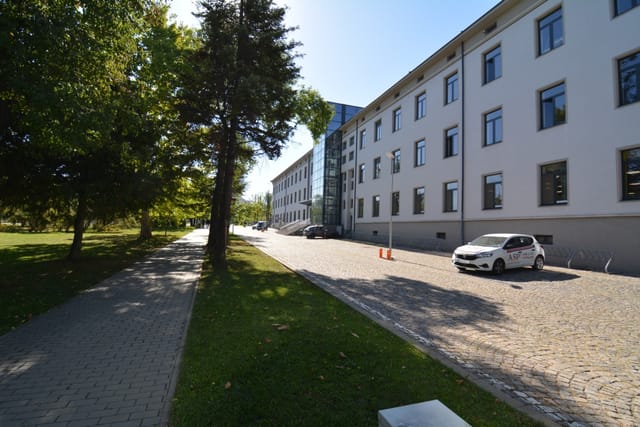 Big recognizable modern building with a bridge view of Sofia