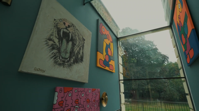 Elegant Regency estate with a private lake and indoor pool, quirky details