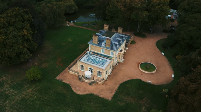 Elegant Regency estate with a private lake and indoor pool, quirky details