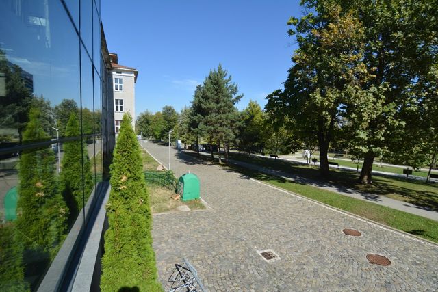 Big recognizable modern building with a bridge view of Sofia